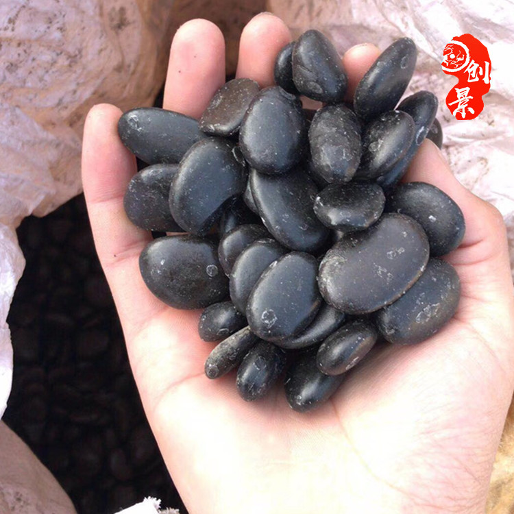 打磨黑色鹅卵石多少钱 发往河源破碎石 黑色砾石广东产地