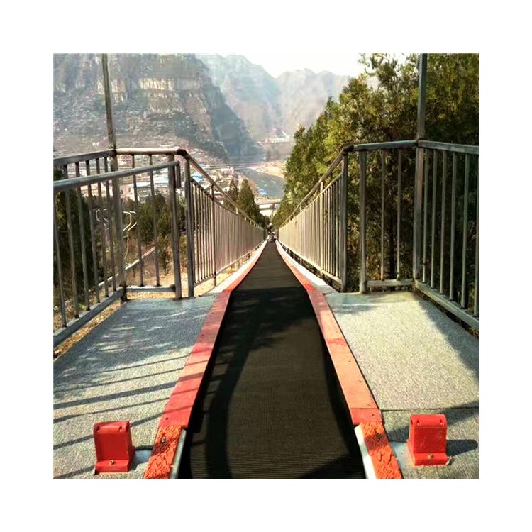 四川景区爬山代步输送带简介 滑雪场魔毯双向运行电梯