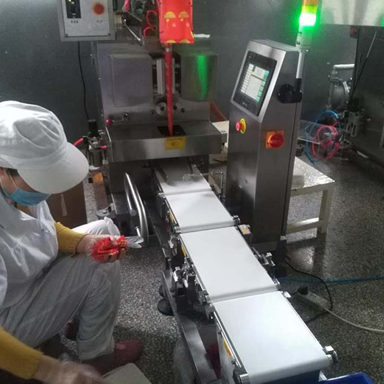 中山精量检重秤食品酱料包应用案例